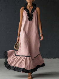 Vestito maxi elegante e romantico con volant e blocchi di colore